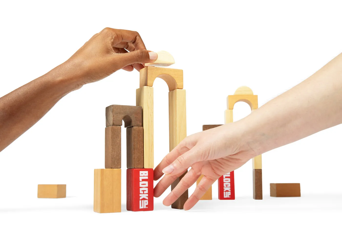 hands building blocks